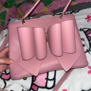Two pink purses